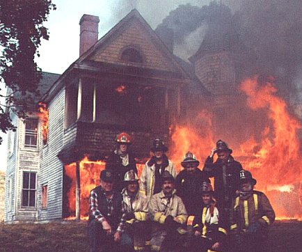 firefighters-in-front-of-house-fire