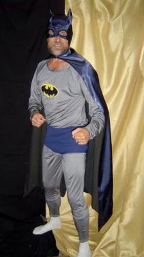 old man in Batman costume, missing parts
